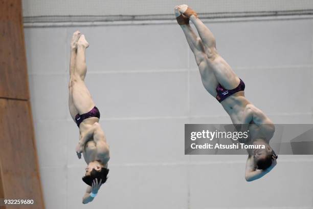 Yuan Cao and Siyi Xie of China compete in the Men's 3m Synchro Platform final during day one of the FINA Diving World Series Fuji at Shizuoka...