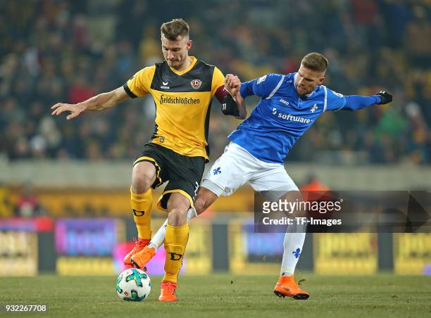 Florian Ballas of Dresden and Tobias Kempe of Darmstadt battle for the ball during the Second Bundesliga match between SG Dynamo Dresden and SV...