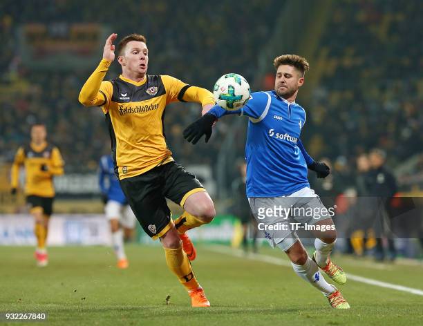 Haris Duljevic of Dresden and Markus Steinhoefer of Darmstadt battle for the ball during the Second Bundesliga match between SG Dynamo Dresden and SV...