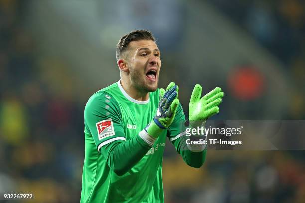 Goalkeeper Daniel Heuer Fernandes of Darmstadt gestures during the Second Bundesliga match between SG Dynamo Dresden and SV Darmstadt 98 at...