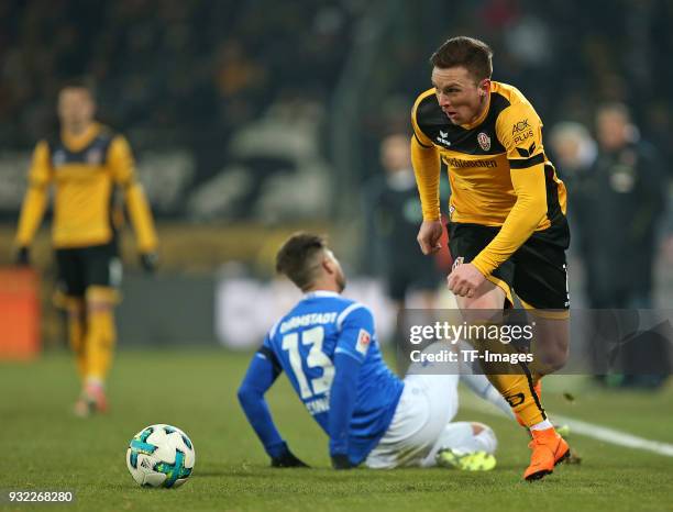 Markus Steinhoefer of Darmstadt and Haris Duljevic of Dresden battle for the ball during the Second Bundesliga match between SG Dynamo Dresden and SV...
