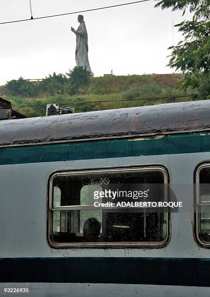 Cuban passenger waits for the departure of the Hershey's train at Casa Blanca neighbourhood in Havana on November 17, 2009. In 1916 the Hershey...