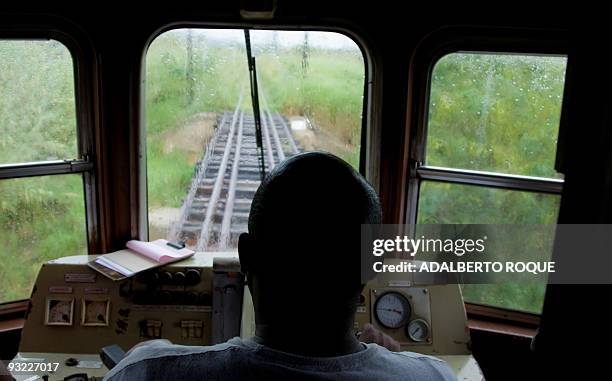 The driver of the Hershey's train waits for the re-establishment of the electricity to continue the trip in Havana on November 17, 2009. In 1916 the...