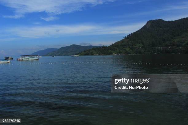 View of Lake Toba. Lake Toba is the largest volcanic lake in Southeast Asia. The lake is located in North Sumatra, Indonesia has a length of about...