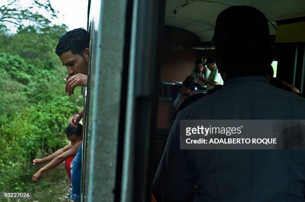 Passengers wait for the re-establishment of the electricity to continue the trip of the Hershey's train in Havana on November 17, 2009. In 1916 the...