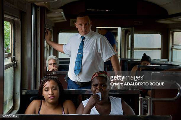 Passengers of the Hershey's train wait for the re-establishment of the electricity to continue the trip in Havana on November 17, 2009. In 1916 the...