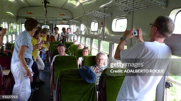 Tourist dance during the trip of the new Hershey's train in Havana on November 17, 2009. In 1916 the Hershey Corporation of Pennsylvania built a...