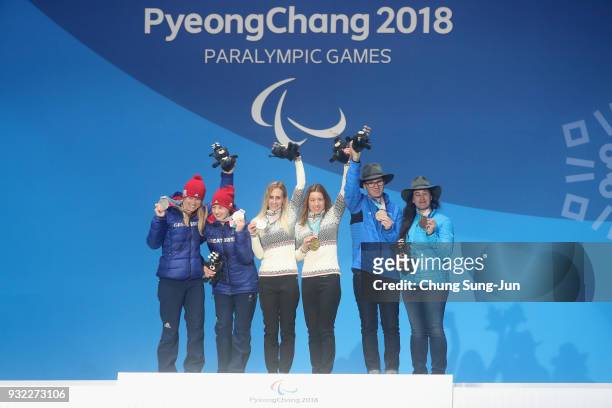 Silver medallist Menna Fitzpatrick of Great Britain and her guide Jennifer Kehoe, Gold medallist Henrieta Farkasova of Slovakia and her guide Natalia...