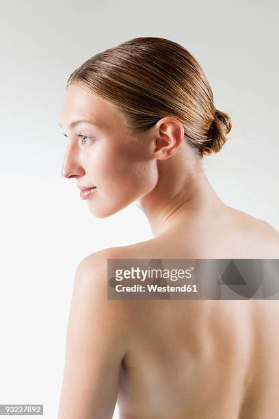 young woman, rear view, portrait - blonde hair rear white background stock pictures, royalty-free photos & images