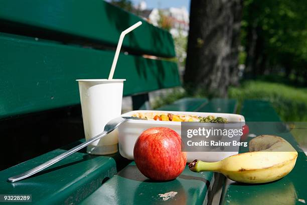 food on park bench, close-up - park bench stock pictures, royalty-free photos & images