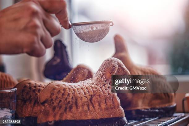 preparing easter lamb cake in domestic kitchen - easter lamb stock pictures, royalty-free photos & images