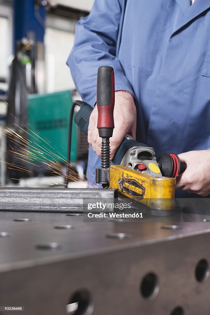 Germany, Neukirch, Person using grinder