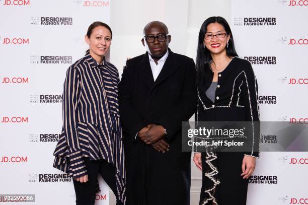 Caroline Rush , Edward Enninful and Xia Ding during the final judging day of the BFC/Vogue Designer Fashion Fund at Mortimer House on March 15, 2018...