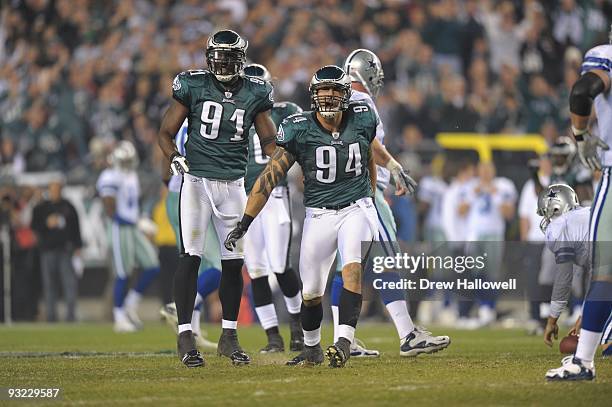 Defensive end Jason Babin and defensive end Chris Clemons of the Philadelphia Eagles celebrate during the game against the Dallas Cowboys on November...