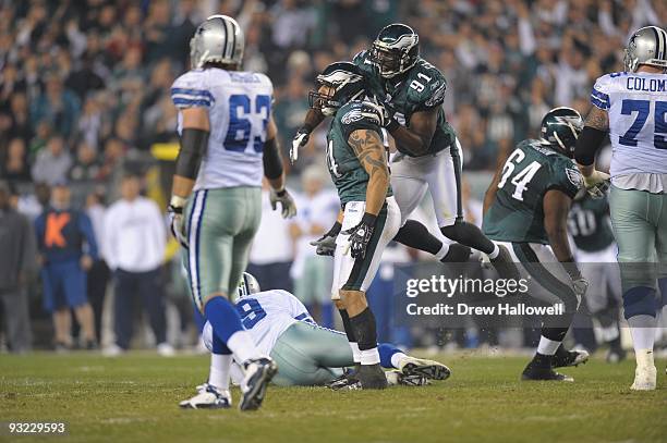 Defensive end Jason Babin and defensive end Chris Clemons of the Philadelphia Eagles celebrate during the game against the Dallas Cowboys on November...