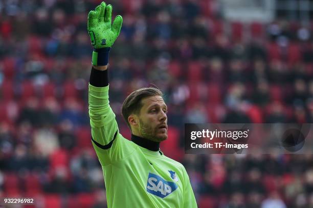 Goalkeeper Oliver Baumann of Hoffenheim gestures during the Bundesliga match between FC Augsburg and TSG 1899 Hoffenheim at WWK Arena on March 03,...