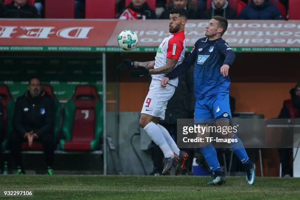 Shawn Parker of Augsburg and Pavel Kaderabek of Hoffenheim battle for the ball during the Bundesliga match between FC Augsburg and TSG 1899...