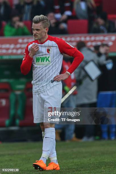 Philipp Max of Augsburg looks dejected during the Bundesliga match between FC Augsburg and TSG 1899 Hoffenheim at WWK Arena on March 03, 2018 in...