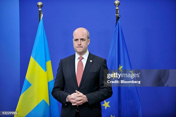 Fredrik Reinfeldt, Sweden's prime minister and standing president of the European Council, waits to greet EU heads of state before the start of the...