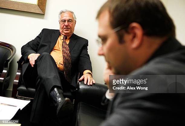 Chairman of the FreedomWorks and former U.S. House Majority Leader Dick Armey waits with his aide Adam Brandon in a holding room for his turn to...