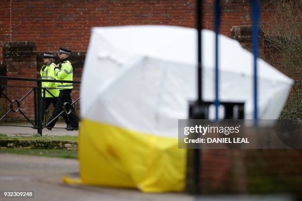 Bench covered in a protective tent is seen at The Maltings shopping centre in Salisbury, southern England, on March 15 as investigations and...