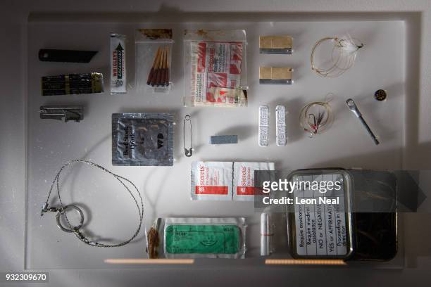 Sergeant Andy McNab's survival kit from 1991, is seen in a display case, at the National Army Museum on March 15, 2018 in London, England. "Special...