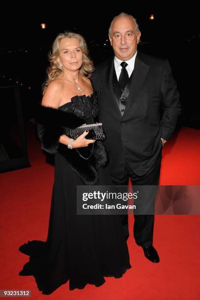 Sir Philip Green and guest arrive at the 2010 Pirelli Calendar launch party at Old Billingsgate on November 19, 2009 in London, England.