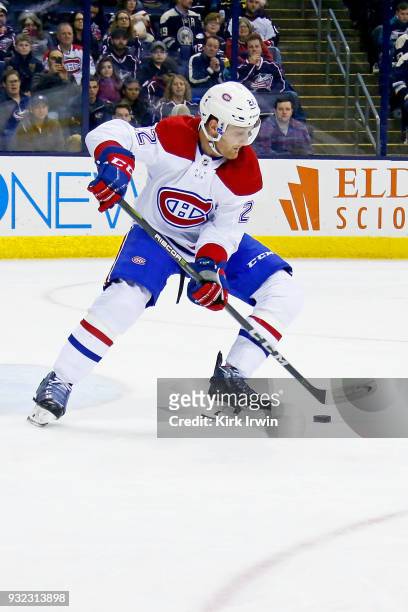 Karl Alzner of the Montreal Canadiens controls the puck during the game against the Columbus Blue Jackets on March 12, 2018 at Nationwide Arena in...