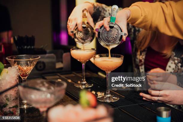 pouring cocktails - cocktail and mocktail stock pictures, royalty-free photos & images