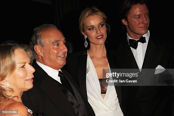 Sir Philip Green and Eva Herzigova and guests arrive at the 2010 Pirelli Calendar launch party at Old Billingsgate on November 19, 2009 in London,...
