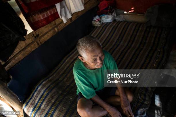 An abandoned Old Man at his temporary place to stay in South Tangerang, Banten on 15 March 2018. Tangerang Selatan is one of rich area in Indonesia,...