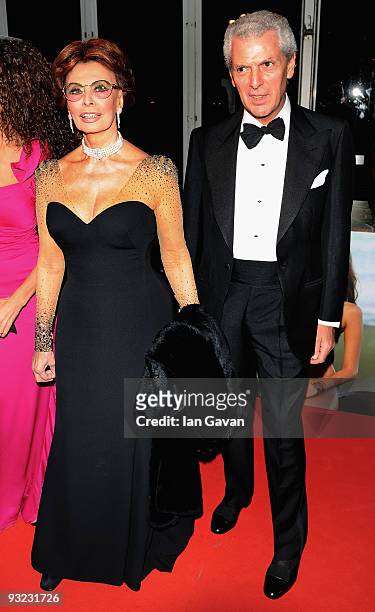 Actress Sophia Loren and Marco Tronchetti Provera the Chairman of Pirelli arrive at the 2010 Pirelli Calendar launch party at Old Billingsgate on...