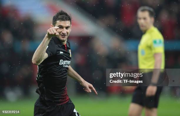 Lucas Alario of Leverkusen celebrates after scoring his team's first goal during the Bundesliga match between Bayer 04 Leverkusen and Borussia...