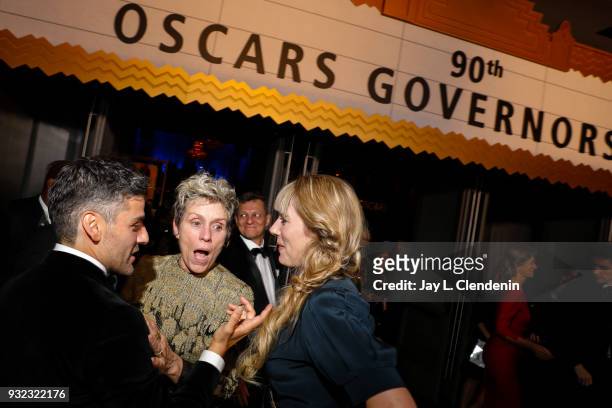 March 4, 2018--Best Actress Oscar winner Frances McDormand, center, talks with Oscar Isaac and Elvira Lind about not being able to find her just-won...