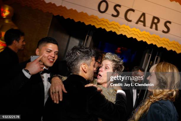 March 4, 2018--With her son Pedro, far left, Best Actress Oscar winner Frances McDormand, center, talks with Oscar Isaac and Elvira Lind about not...