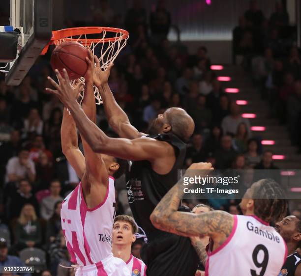 Malcolm Hill of Bonn and Derrick Allen of Jena battle for the ball during the Basketball Bundesliga match between Telekom Baskets Bonn and Science...