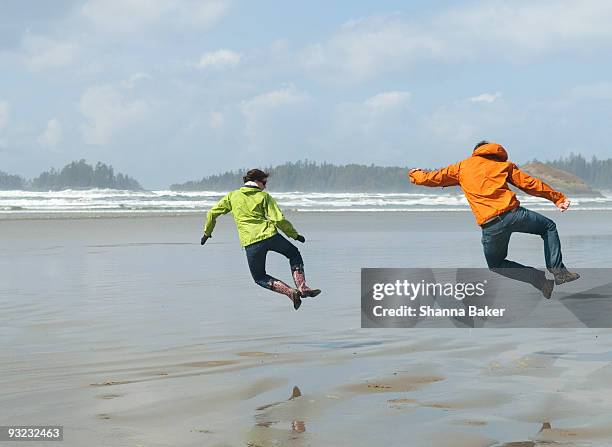 two people clicking heels in tandem - long beach britisch kolumbien stock-fotos und bilder