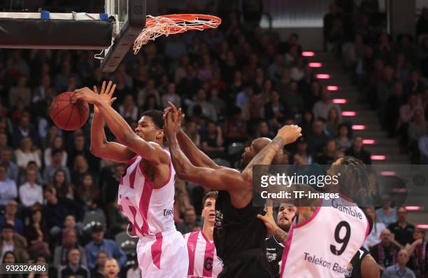 Malcolm Hill of Bonn and Derrick Allen of Jena battle for the ball during the Basketball Bundesliga match between Telekom Baskets Bonn and Science...