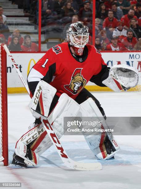 Mike Condon of the Ottawa Senators tends net against the Calgary Flames at Canadian Tire Centre on March 9, 2018 in Ottawa, Ontario, Canada.