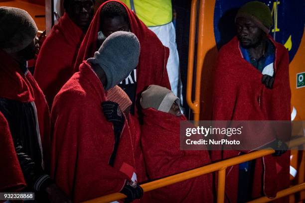 The Spanish Red Cross attending 48 migrants at the Harbour of Malaga on 14 March 2018 in Malaga, Spain. Late in the afternoon, 48 migrants among them...