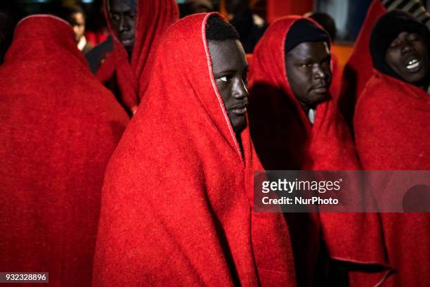 The Spanish Red Cross attending 48 migrants at the Harbour of Malaga on 14 March 2018 in Malaga, Spain. Late in the afternoon, 48 migrants among them...