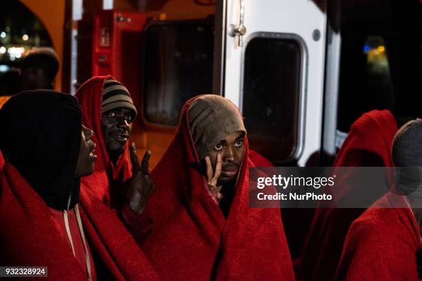 The Spanish Red Cross attending 48 migrants at the Harbour of Malaga on 14 March 2018 in Malaga, Spain. Late in the afternoon, 48 migrants among them...