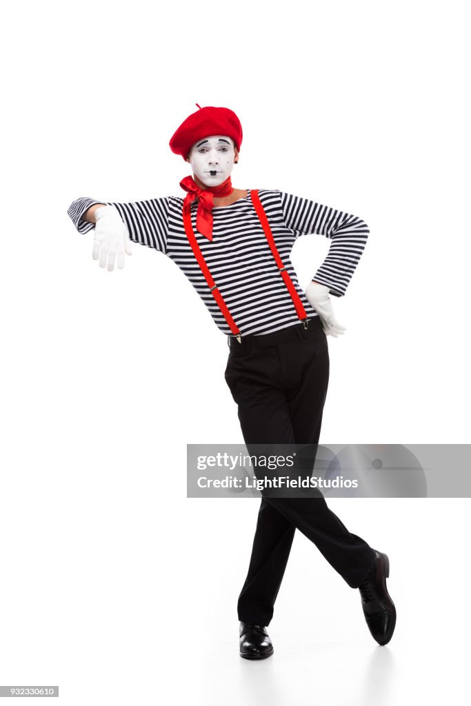 Mime pretending leaning on something isolated on white