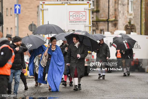 Cast and crew from the TV series Outlander arrive at a filming location at St Andrew's Square on March 15, 2018 in Glasgow, Scotland. Dozens of fans...