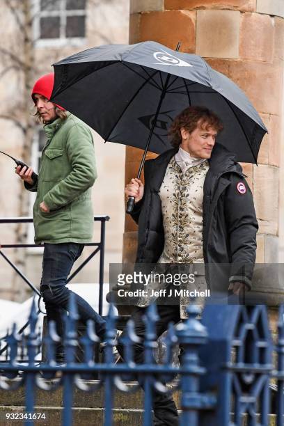 Actror Sam Heughan from the TV series Outlander arrives at a filming location at St Andrew's Square on March 15, 2018 in Glasgow, Scotland. Dozens of...