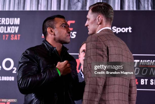 Fabricio Werdum of Brazil and Alexander Volkov of Russia face off during the UFC Fight Night Ultimate Media Day in Glaziers Hall on March 15, 2018 in...