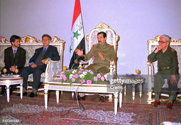 Iraqi President Saddam Hussein meets 26 February with members of the Madrid International Court led by former Algerian President Ahmed Ben Bella ....