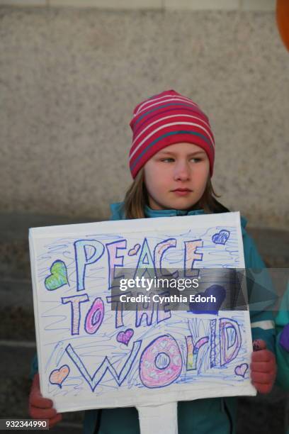 Students at Science, Language and Arts International School participate in a walkout to address school safety and gun violence on March 14, 2018 in...