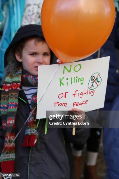 Students at Science, Language and Arts International School participate in a walkout to address school safety and gun violence on March 14, 2018 in...