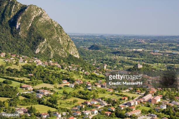 aerial view of gemona del friuli from mount cumieli - gemona del friuli stock pictures, royalty-free photos & images